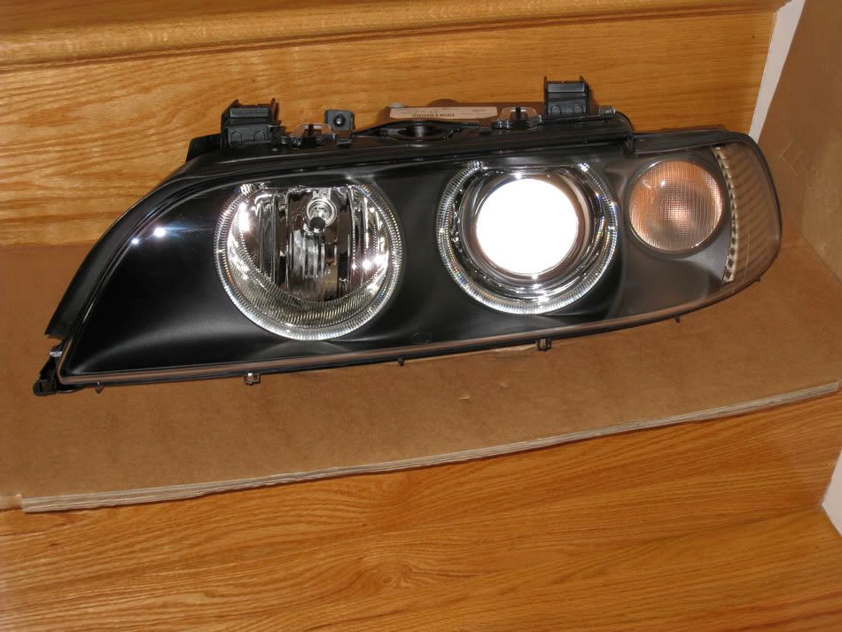E39 HELLA/OEM headlights (Brand New) / complete set...